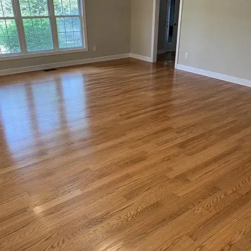 Refinished oak floor ready for guests in an Elora rental home