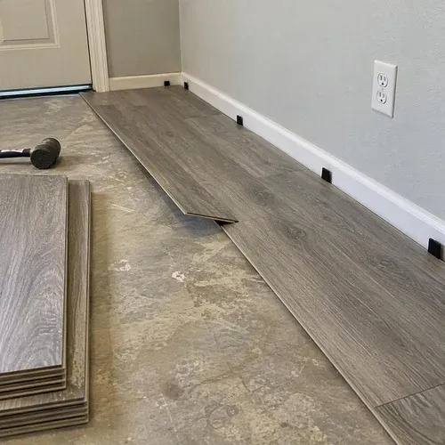 Vinyl plank installed in an older Acton basement