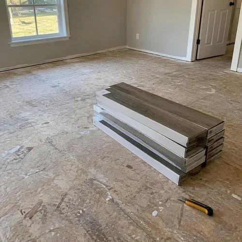 Basement slab prepared for vinyl plank in a new Baden home