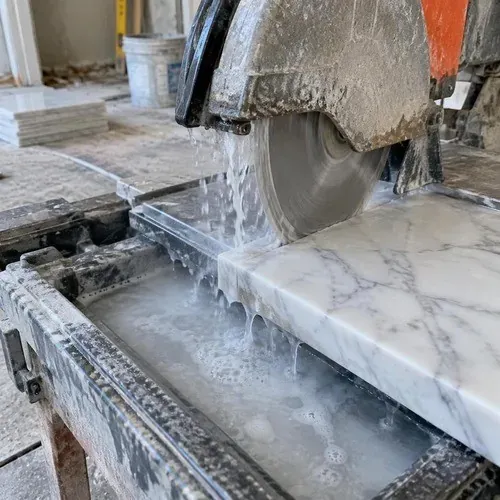 Marble tile edge wet cut on a tile saw