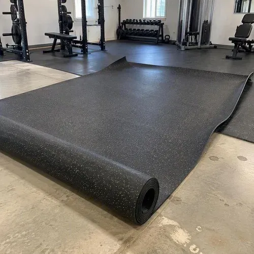 Rubber flooring roll unrolled and relaxing flat before installation