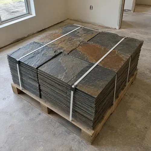 Pallet of cleft slate floor tiles in rust and charcoal tones